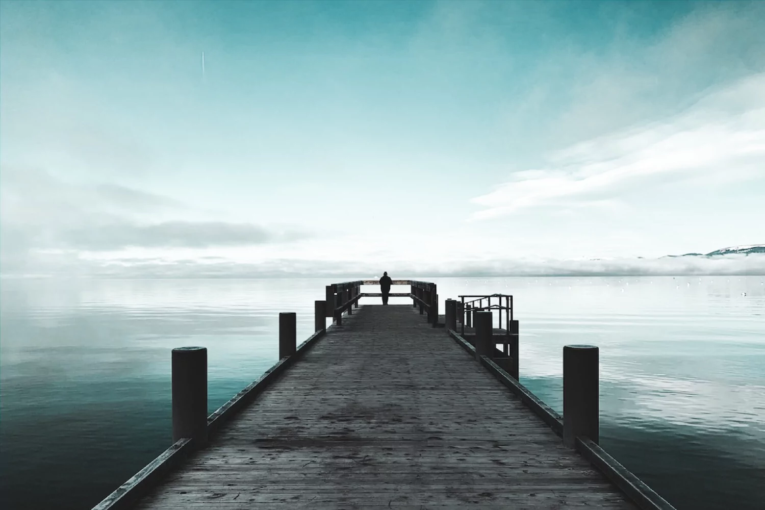 dock leading out to an ocean overlook