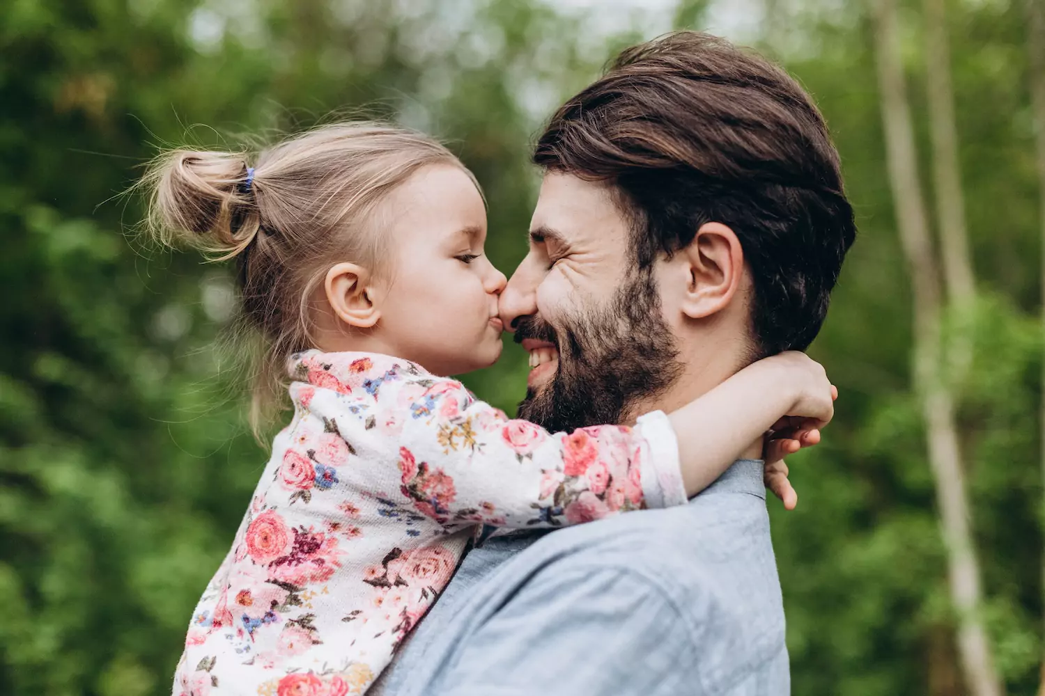 Father And Daughter Having Fun In Park. Parent And His Child Relaxing And Spending Leisure Time Together Outdoors In Nature.
