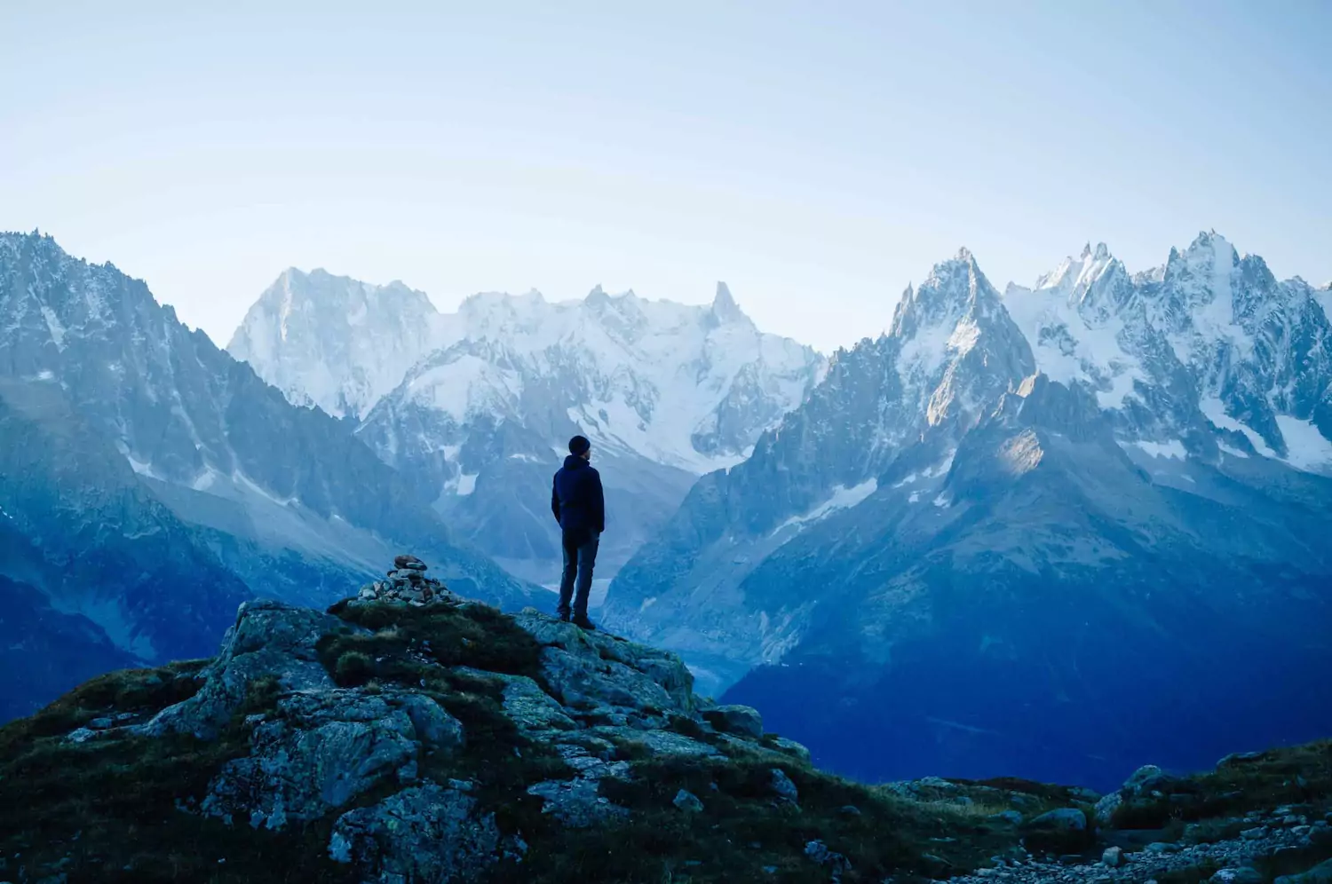 a pastor stands on a mountain, considering how to help members of his congregation overcome porn addiction