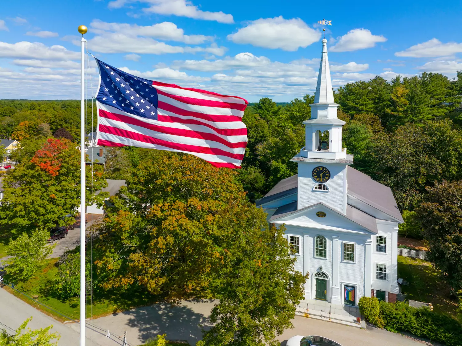 an American church with a tall white steeple