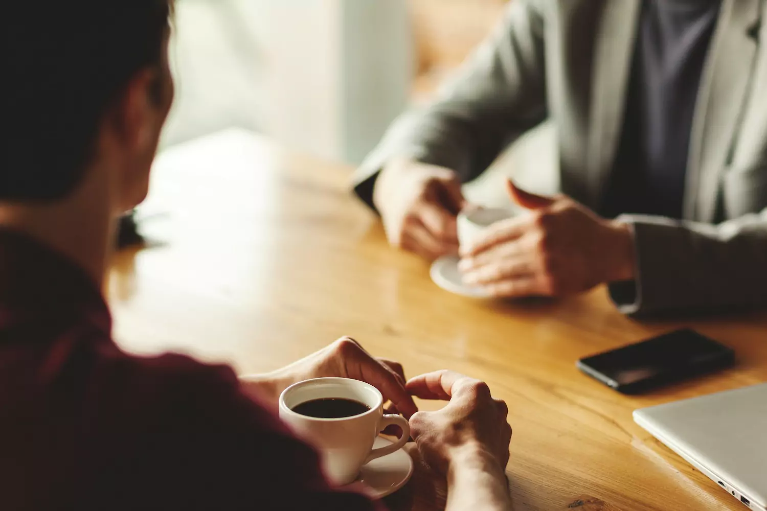 A pastor gets coffee with a young man aspiring to ministry, raising up godly leaders in the church