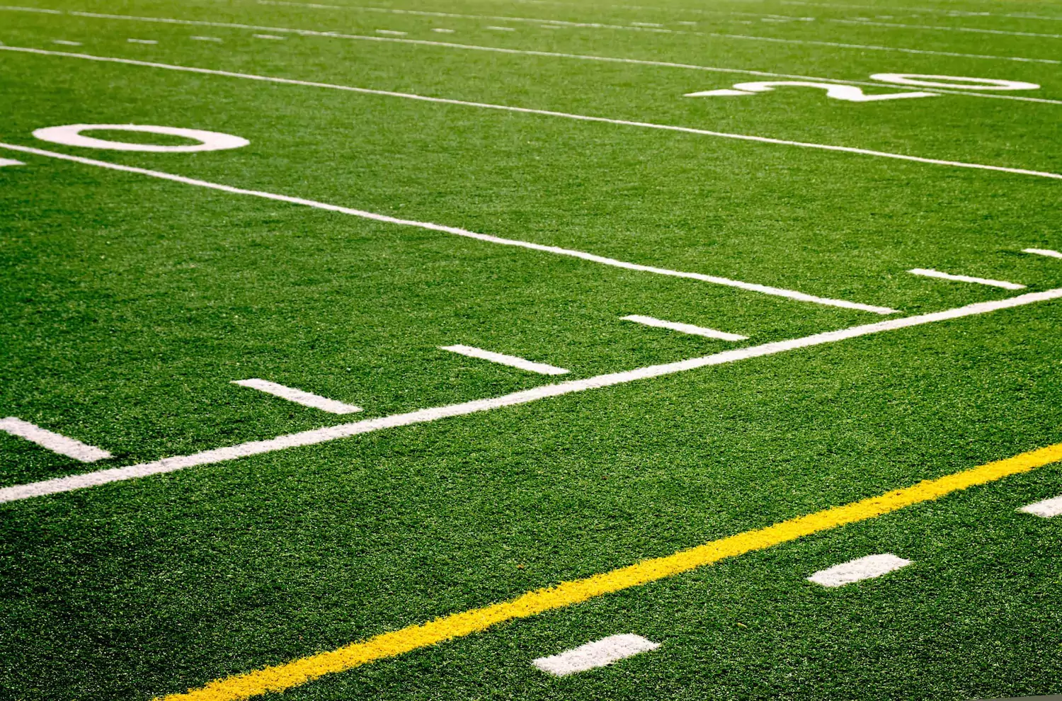 Lines on a football field.