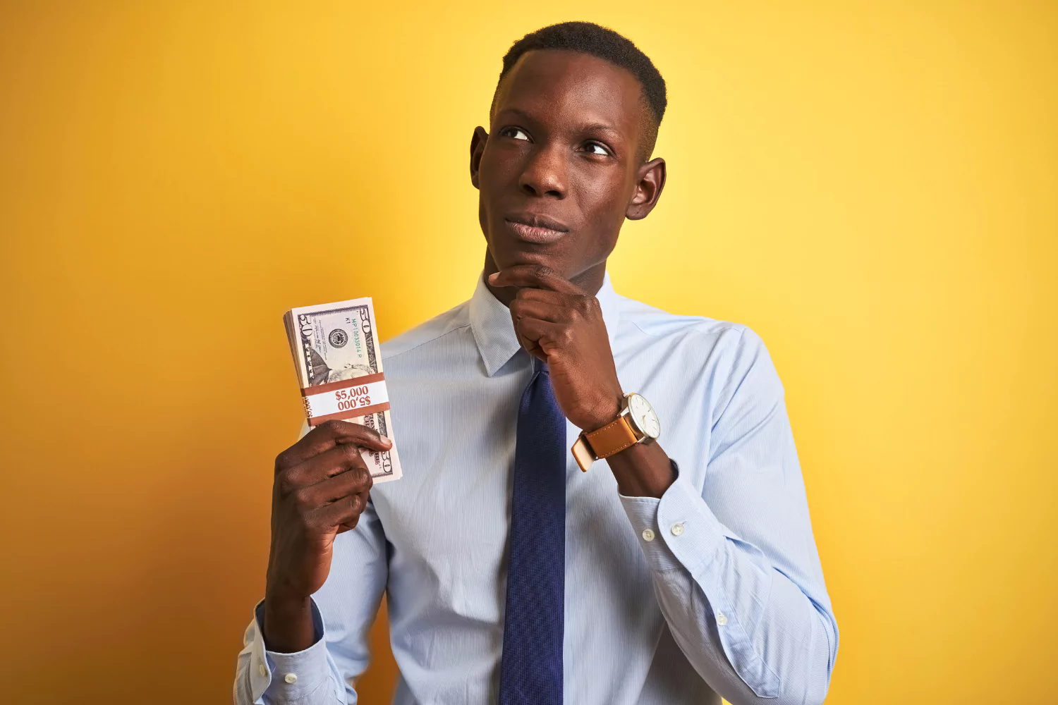 Man considering the theology of money